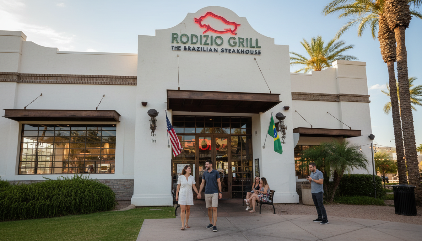 Rodizio Grill restaurant entrance with people walking in, white facade and palm trees outside