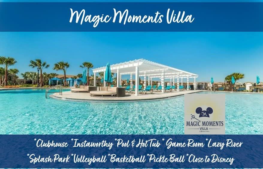 Modern living room with blue sofas, wooden coffee table, and TV on wood panel wall.