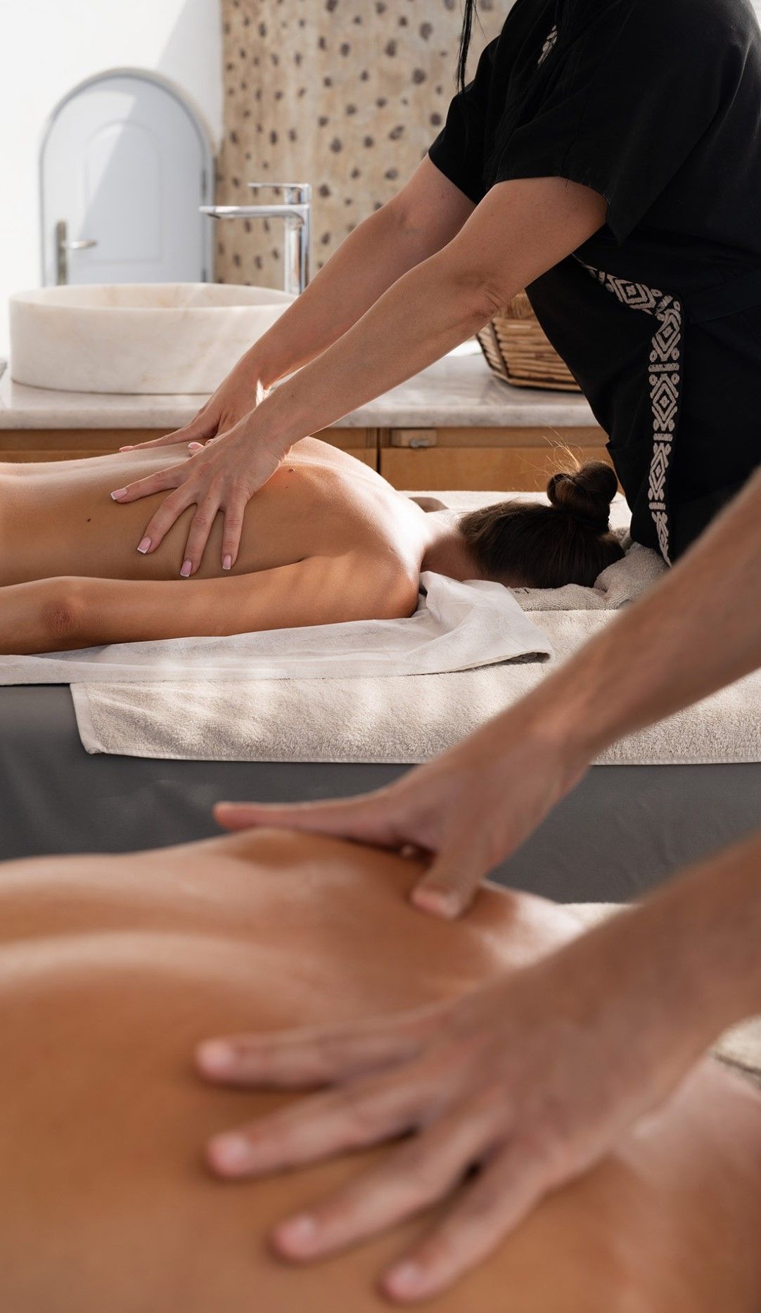 A woman is getting a massage in a spa.