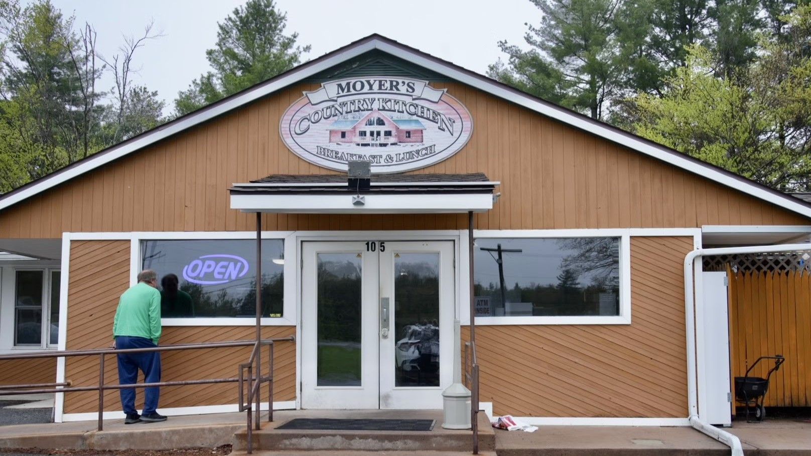 Brown building with the sign 