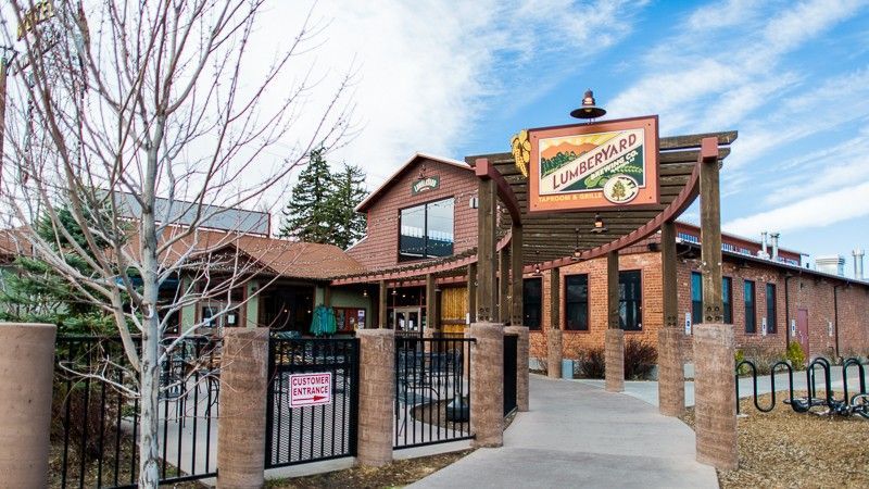 Exterior of a brick building with a sign that reads 