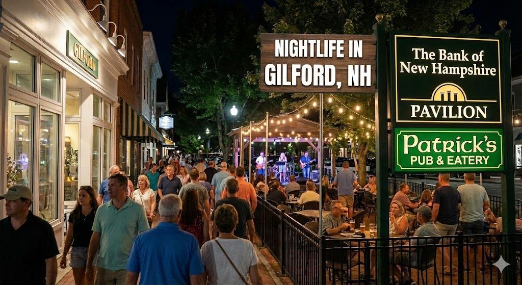 Nightlife scene in Gilford, NH. Crowds walk along a street with outdoor seating, signs, and string lights at night.