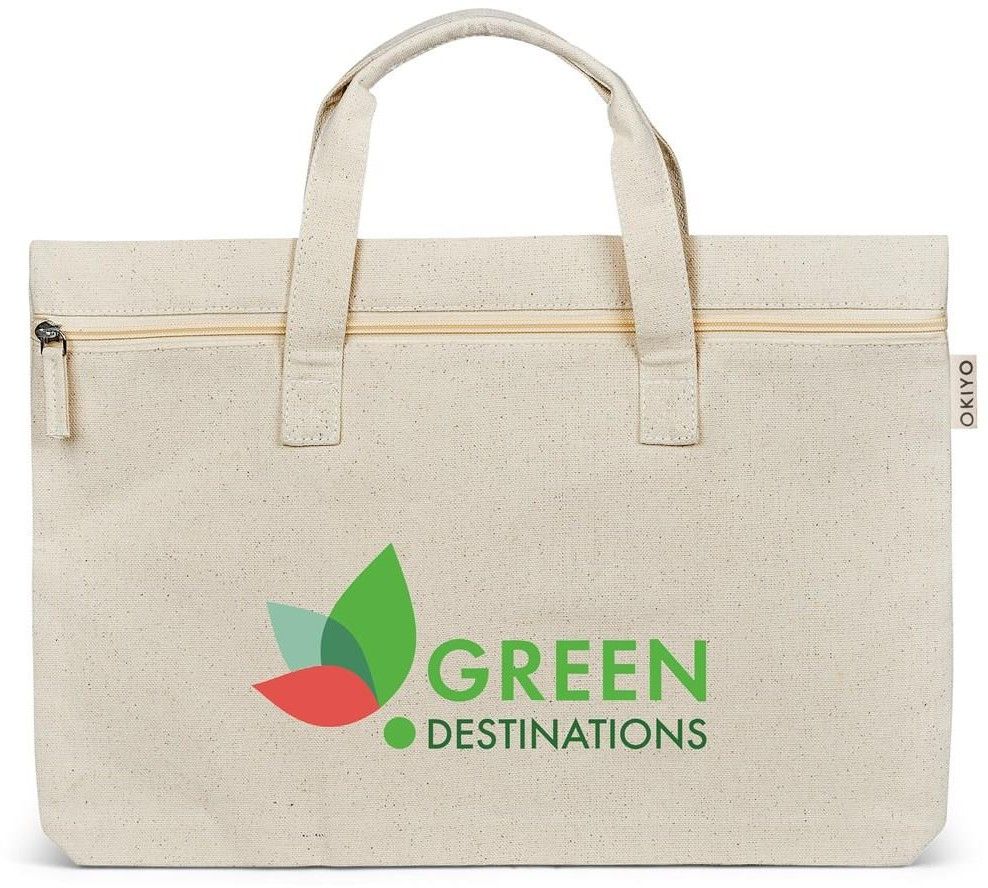 Bolsa de lona bege com logo de folha verde e a inscrição “GREEN DESTINTIONS”