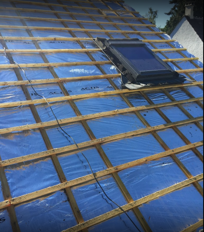 Installation de la couverture de toiture