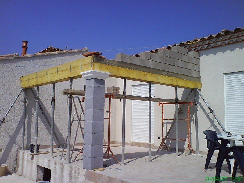 Extension de toit avec charpente traditionnelle