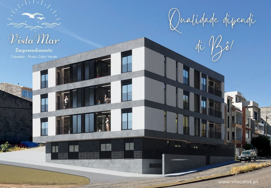 Prédio de apartamentos moderno, Vista Mar, em um local ensolarado com céu azul.