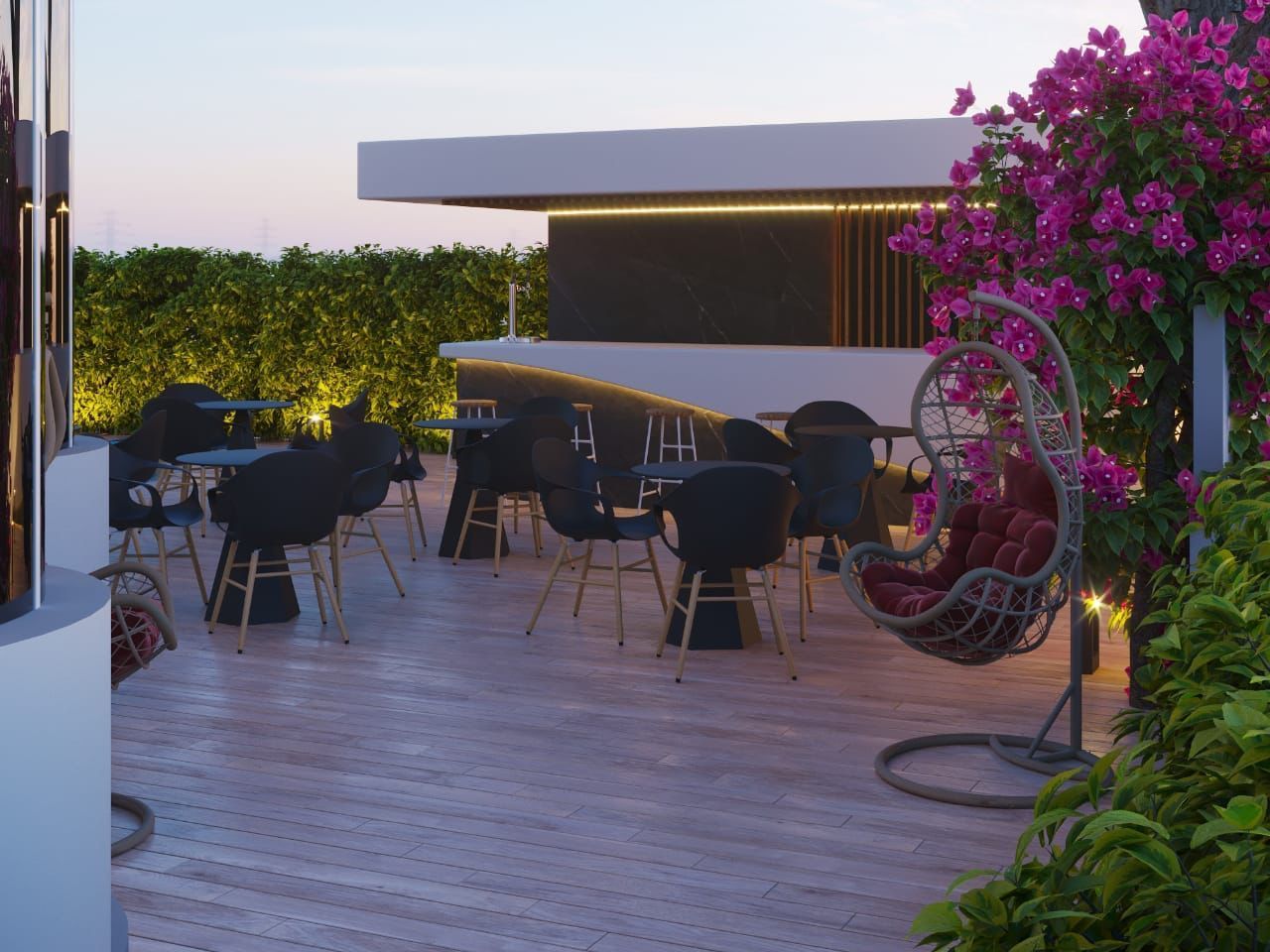 A patio with tables and chairs and a hanging chair.