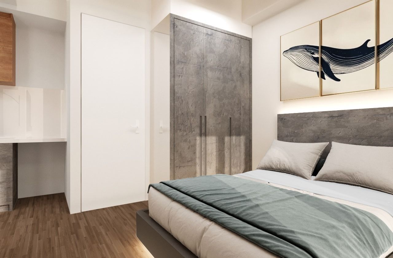 A bedroom with a whale painting on the wall above the bed.