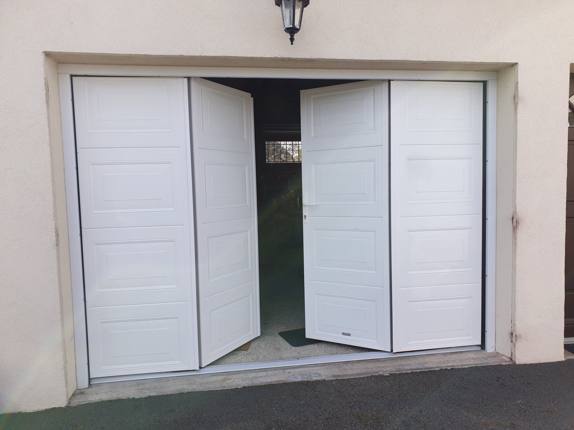 Ouverture porte de garage à la française