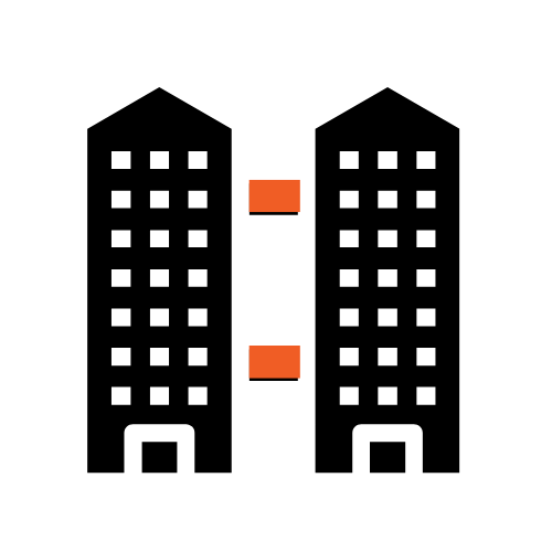 Un icono negro y naranja de dos edificios altos sobre un fondo blanco.