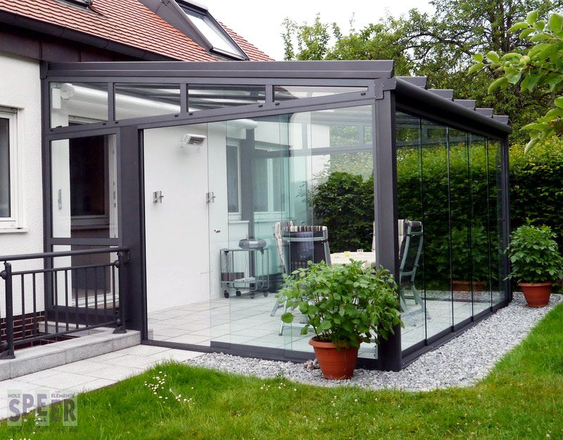 Glashaus mit Ganzglas-Schiebeelemente