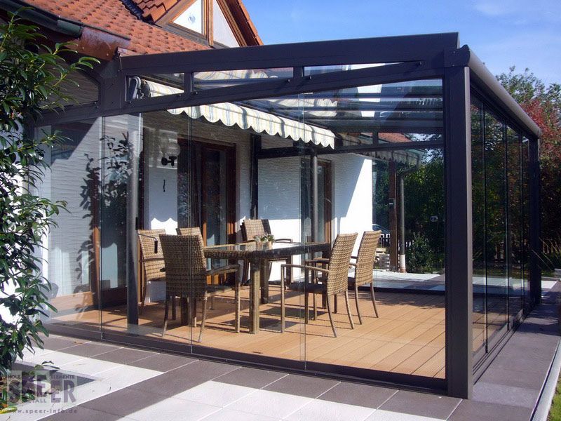 Glashaus mit Ganzglas-Schiebeelemente