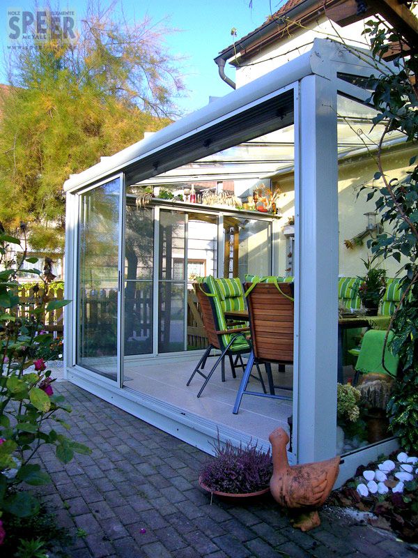 Glashaus mit gerahmte Schiebetüren aus Aluminium