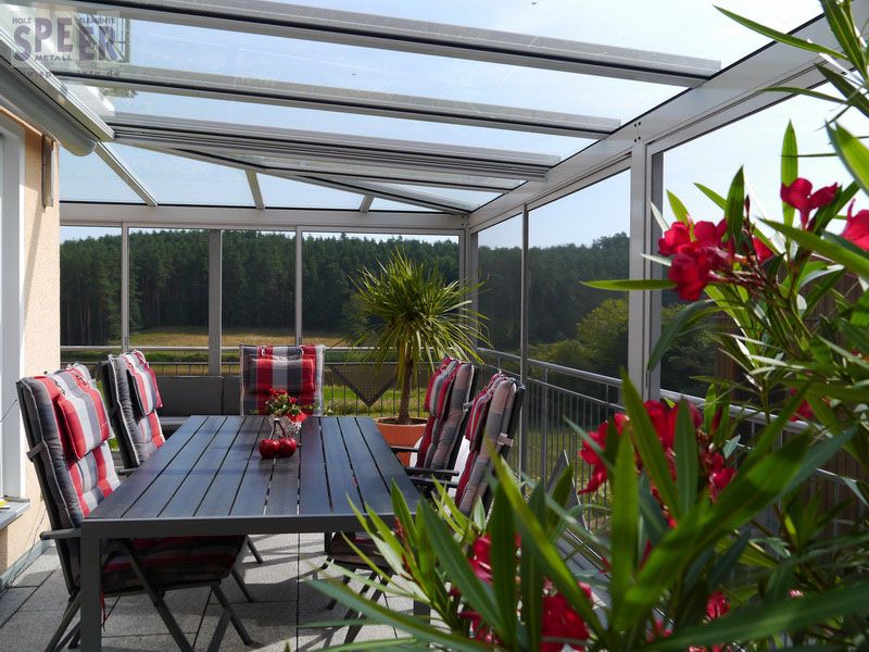 Terrassendach um den Vorbau geführt mit Markise