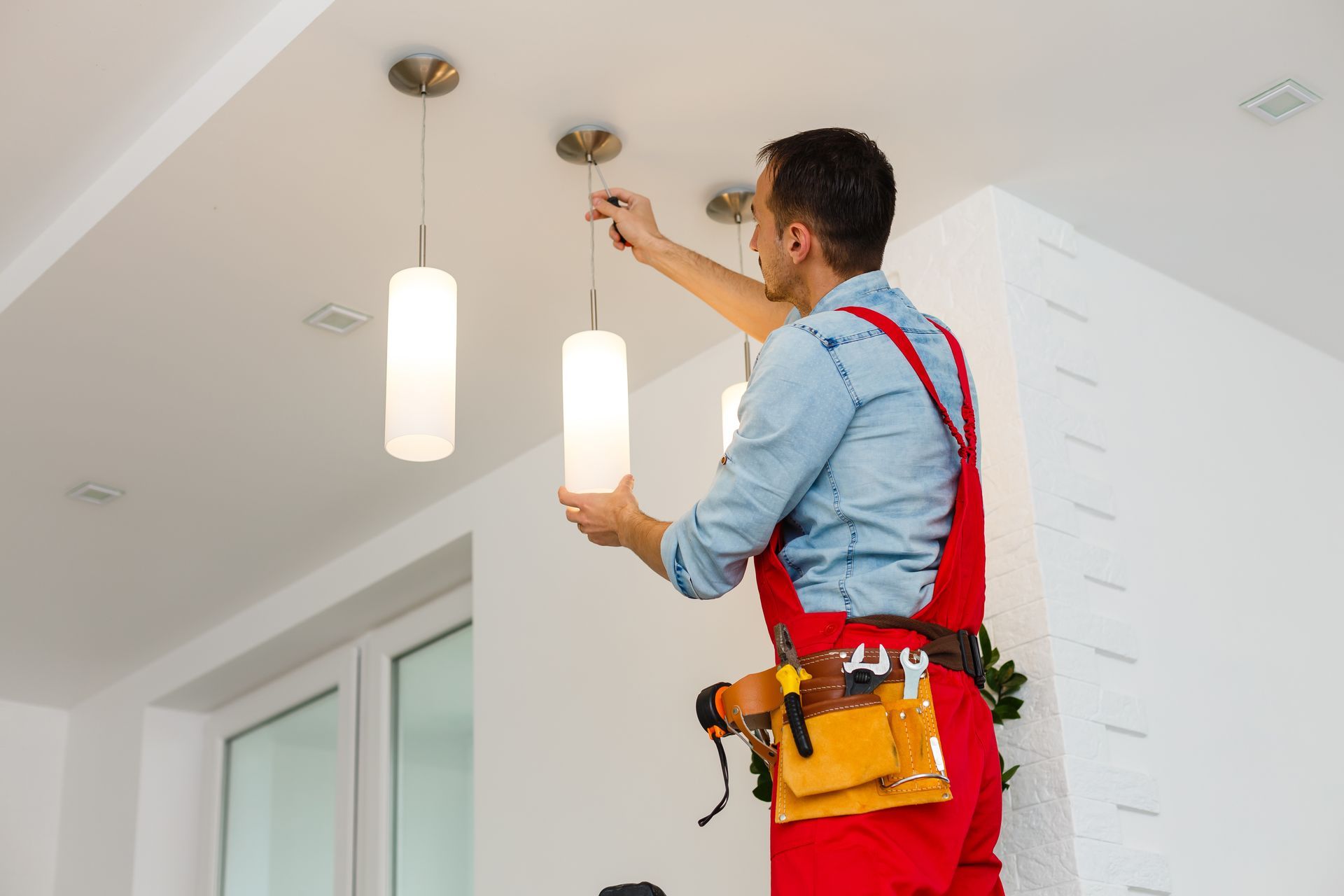 Pose de trois luminaires de cuisine