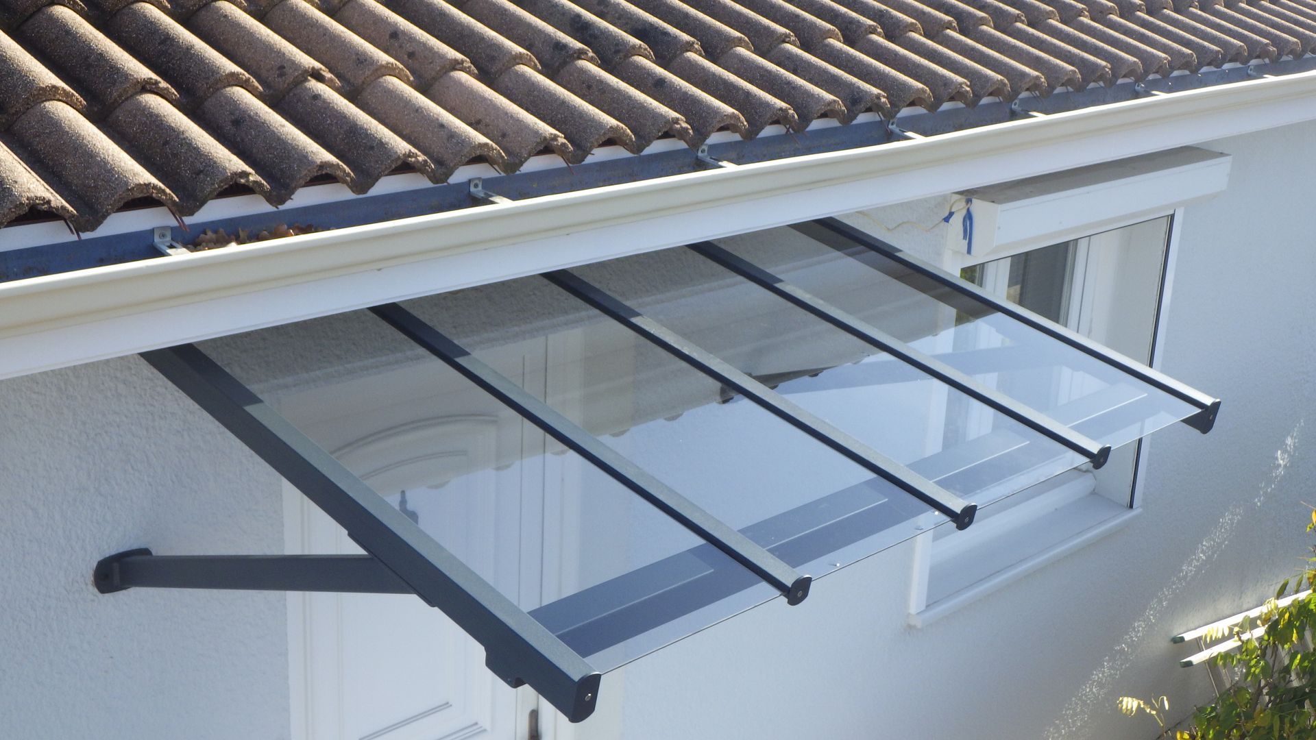 Marquise en verre et en aluminium