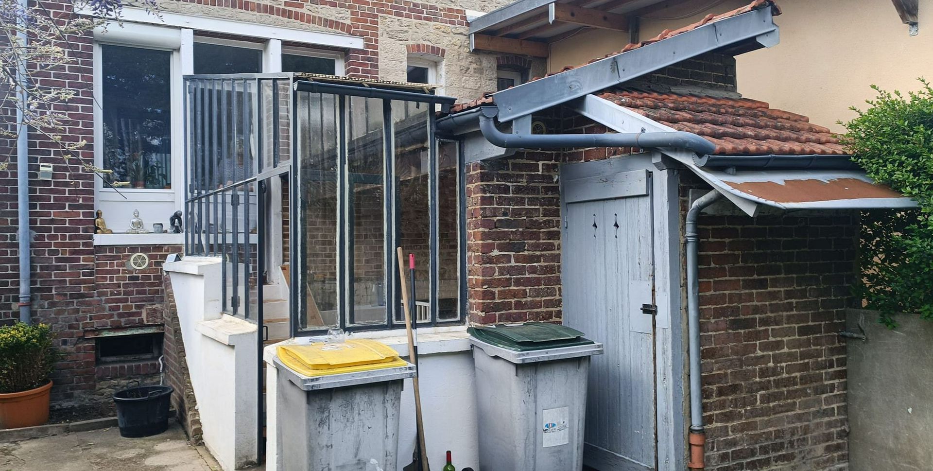 Véranda avant démolition pour agrandissement