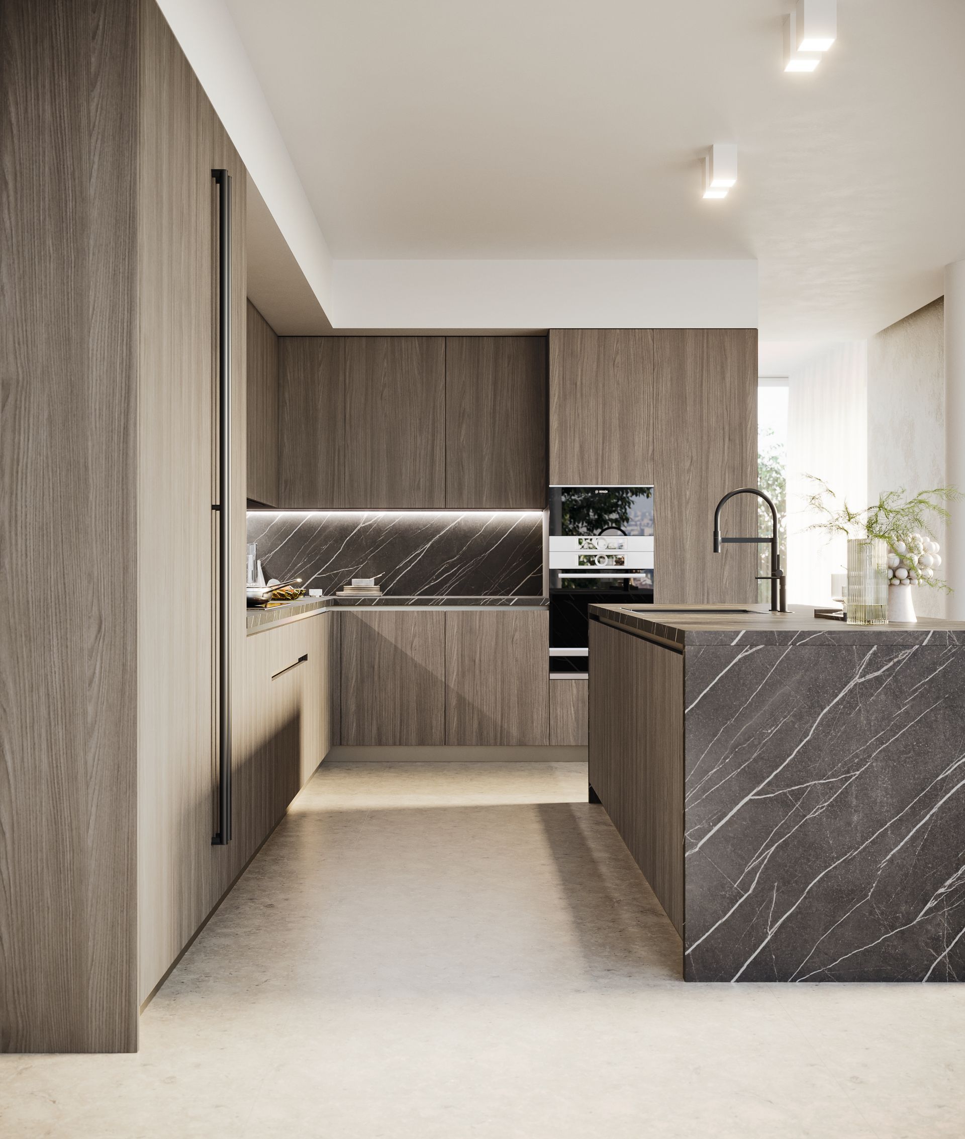 Cocina moderna con gabinetes de madera oscura, encimeras de mármol e isla.