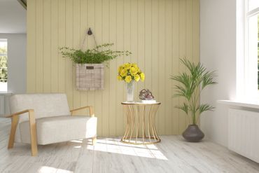 Nojatuoli, pöytä ja kasveja