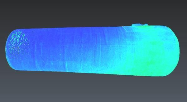 Un objeto cilíndrico, sombreado de azul a verde, con una parte superior adjunta, posiblemente un tanque o contenedor.