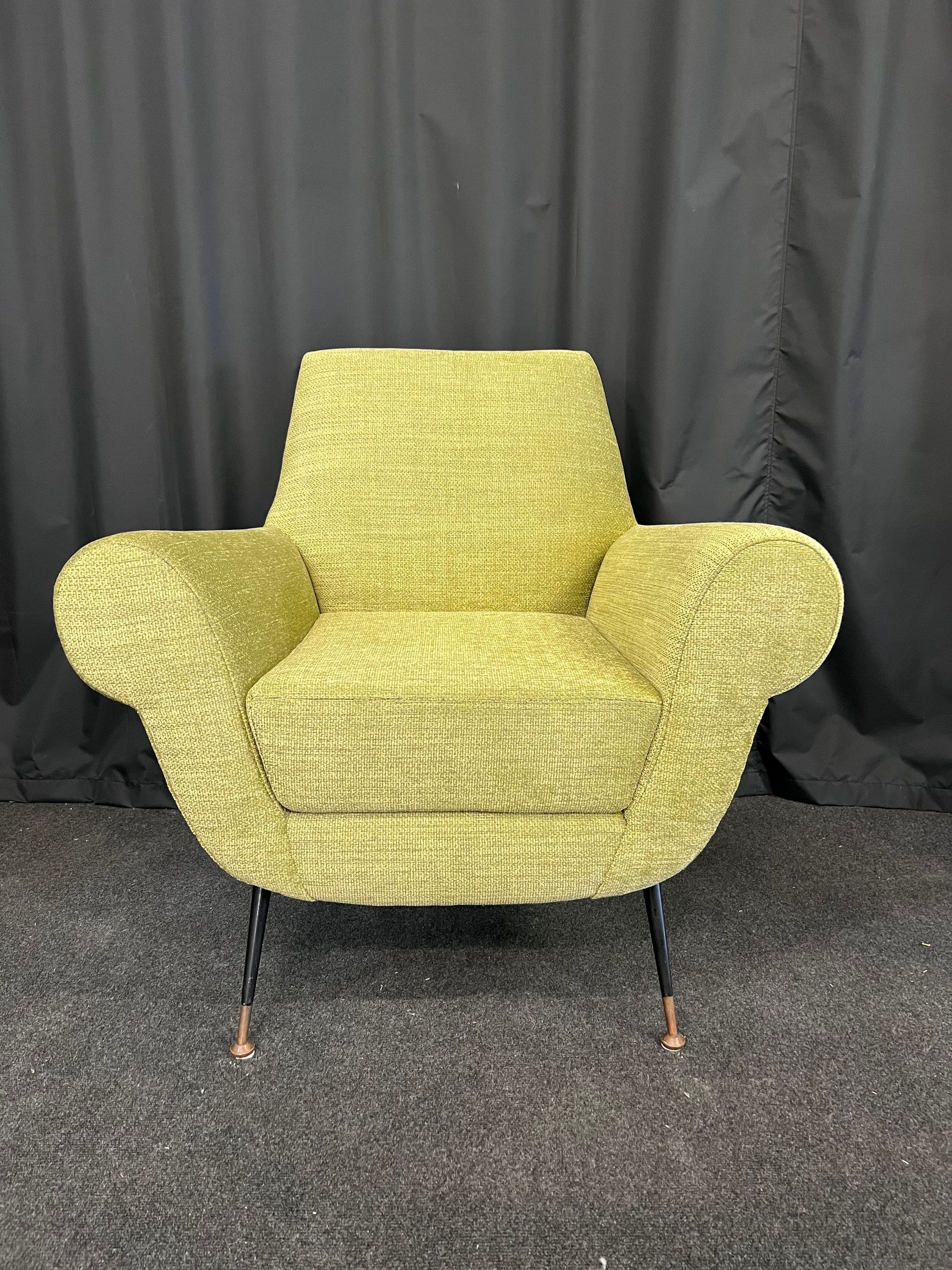 Fauteuil en tissu vert