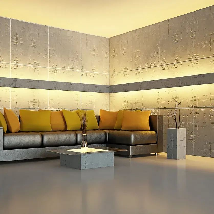 Una sala de estar con un sofá, una mesa de café y paredes de hormigón.