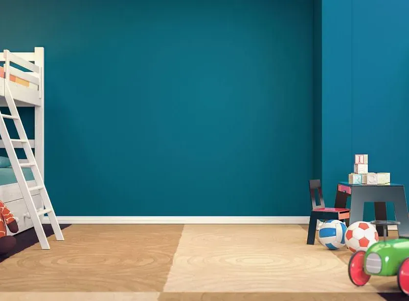 Un dormitorio infantil con una litera y juguetes.