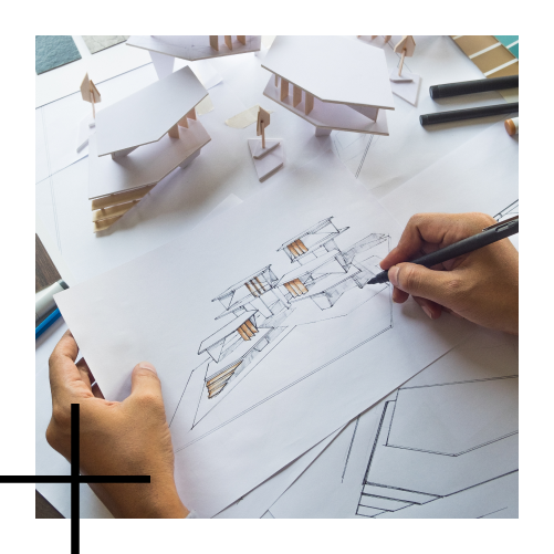 Personne écrivant sur un plan