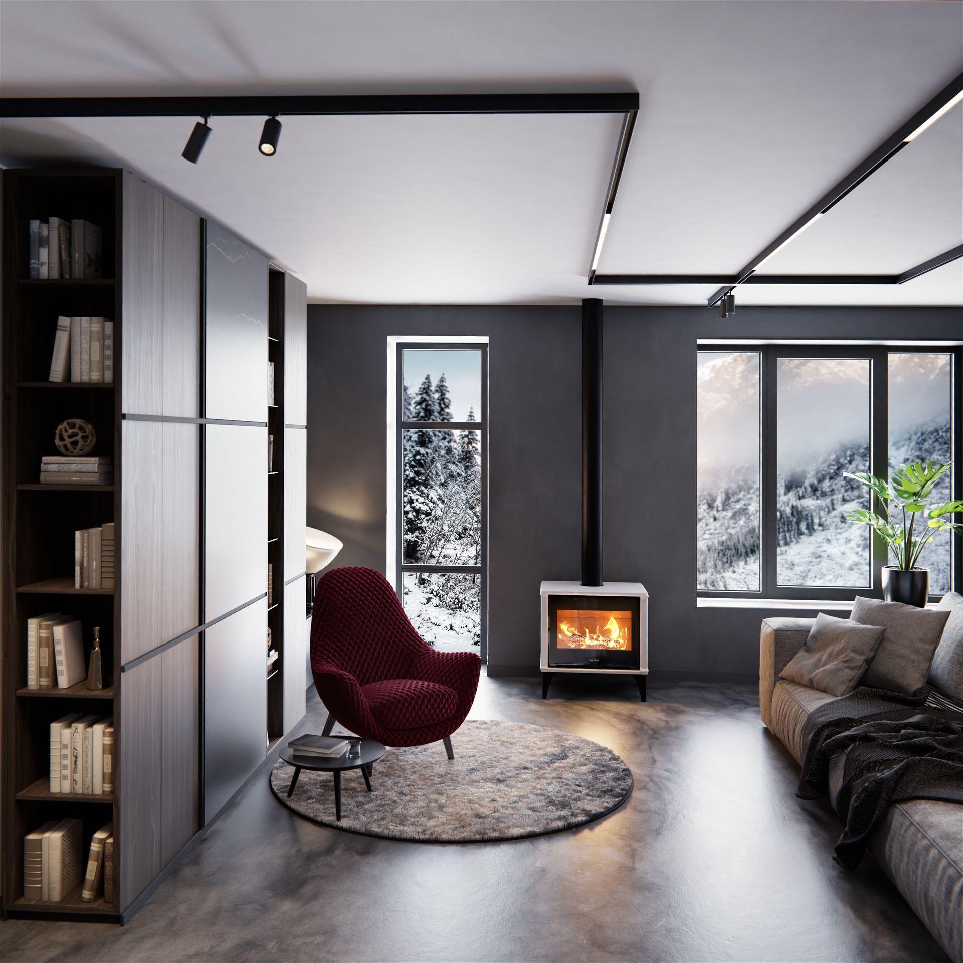 Salon contemporain avec cheminée, fauteuil rouge, bibliothèque, grandes fenêtres et vue sur des montagnes enneigées