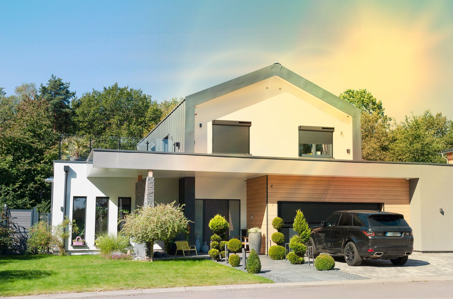 Maison avec volet roulant solaire, voiture devant la porte de garage