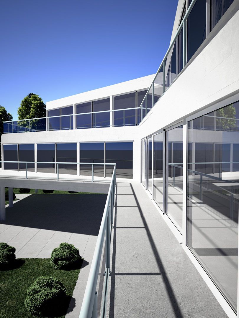 Vue extérieure sur un balcon extérieur avec grande baie vitrée le long de la rambarde 