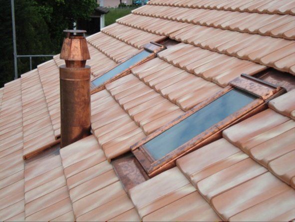 Alain Naef SA - Garniture velux et cheminée ronde