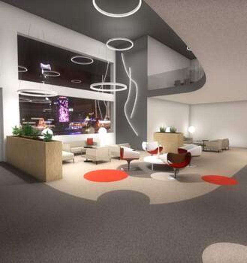 Un salon avec beaucoup de meubles et une grande fenêtre