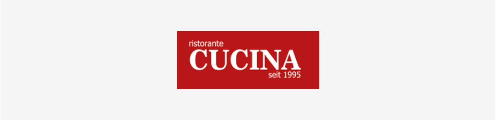 Ein rotes Schild mit der Aufschrift „Cucina“