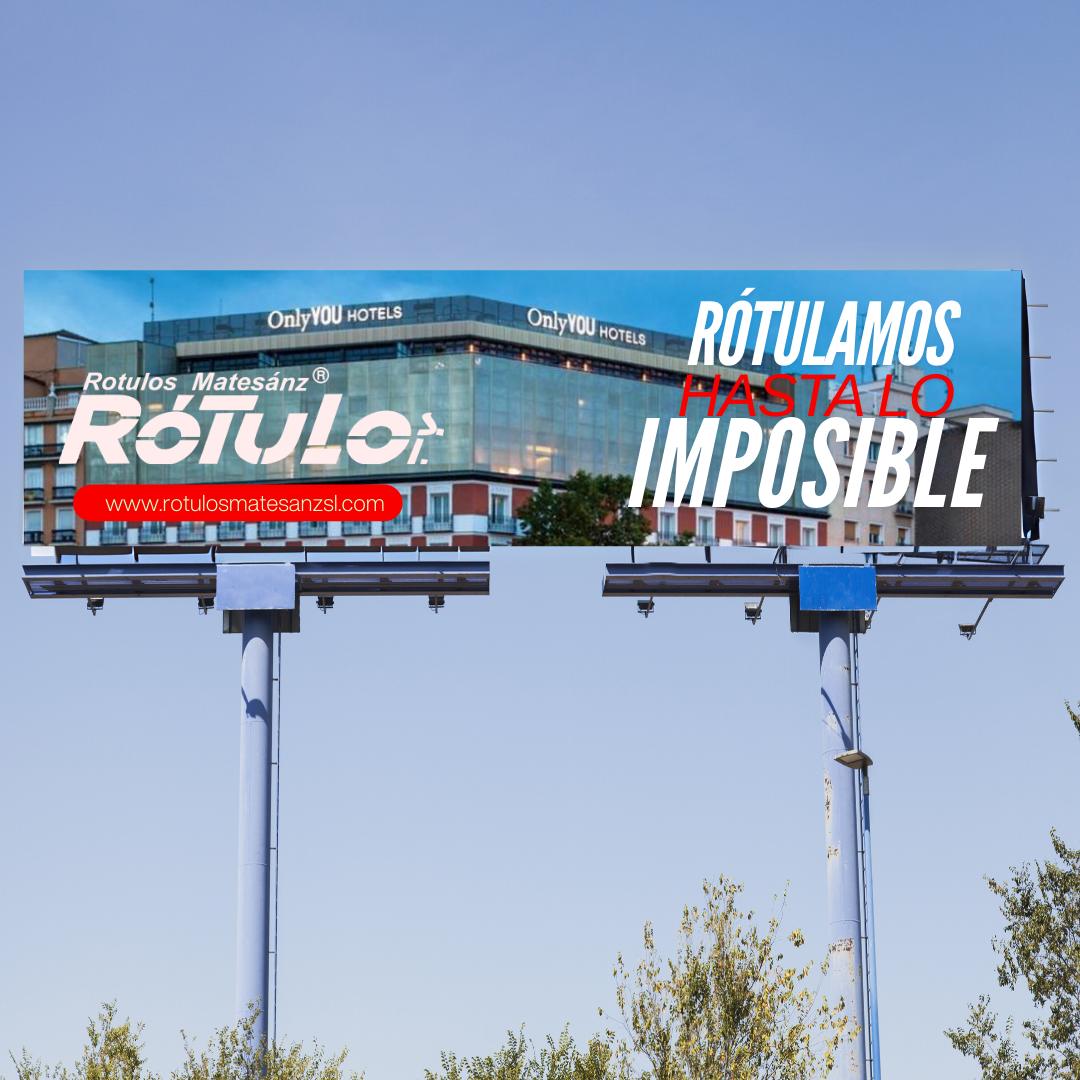 A billboard that says ' rotulamos hasta lo imposible ' on it