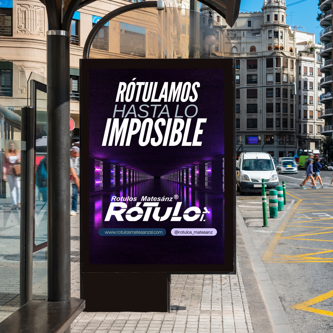 A purple sign that says ' rotulamos hasta lo imposible ' on it