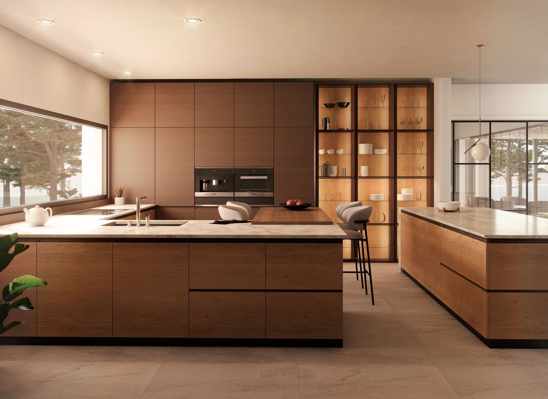 Cocina moderna con armarios de madera, dos islas y un gran ventanal.