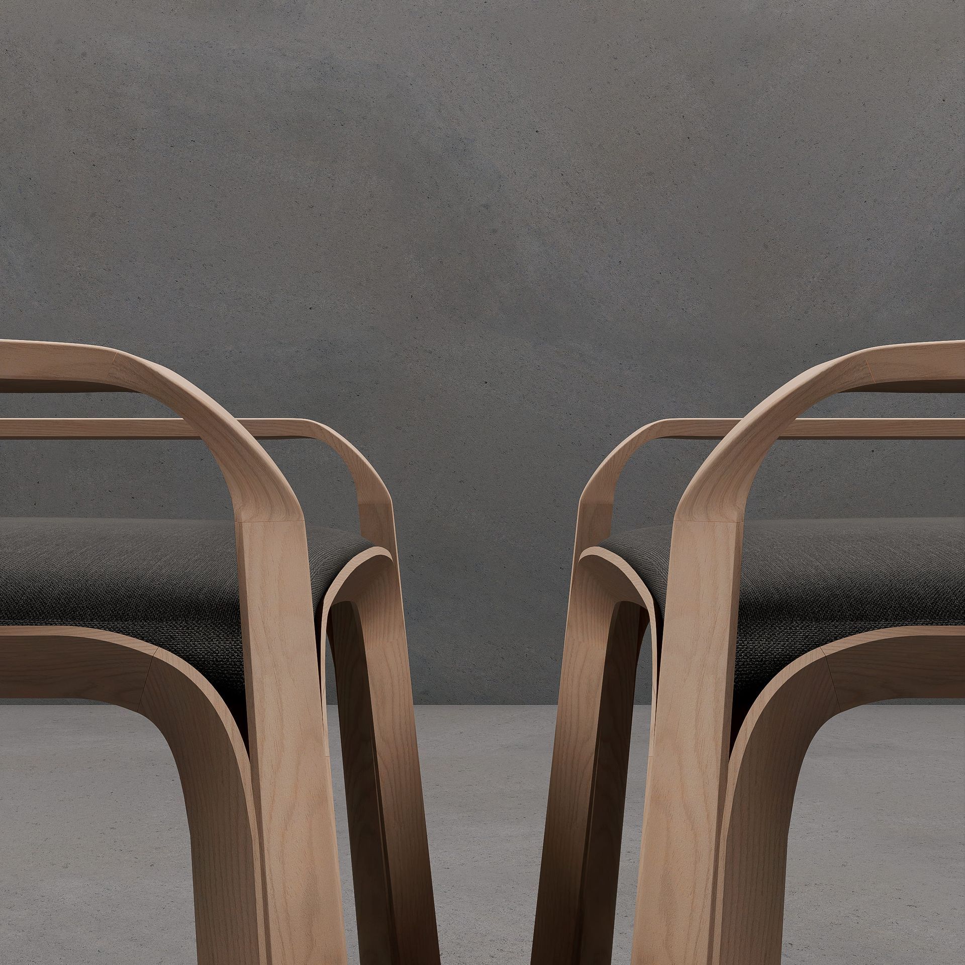 Dos modernas sillas de madera con cojines grises contra una pared gris texturizada.