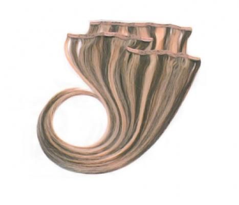 Un primer plano de un montón de extensiones de cabello sobre un fondo blanco.