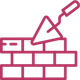 Icono magenta que representa una paleta sobre una pared de ladrillos, sugiriendo trabajos de albañilería o construcción.