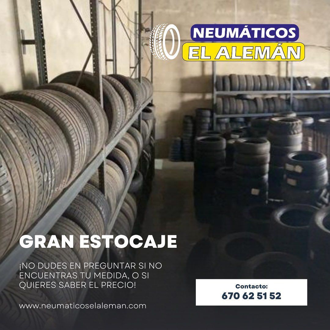 Filas de neumáticos en una bodega, anuncio de