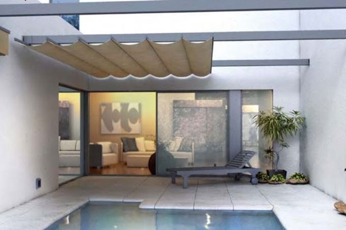 Impresión artística de una casa con piscina.
