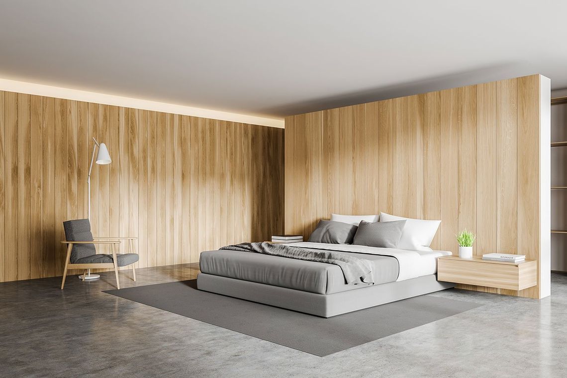 Chambre à coucher avec mur en revêtement en bois