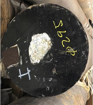 Un círculo negro con una x amarilla sobre él