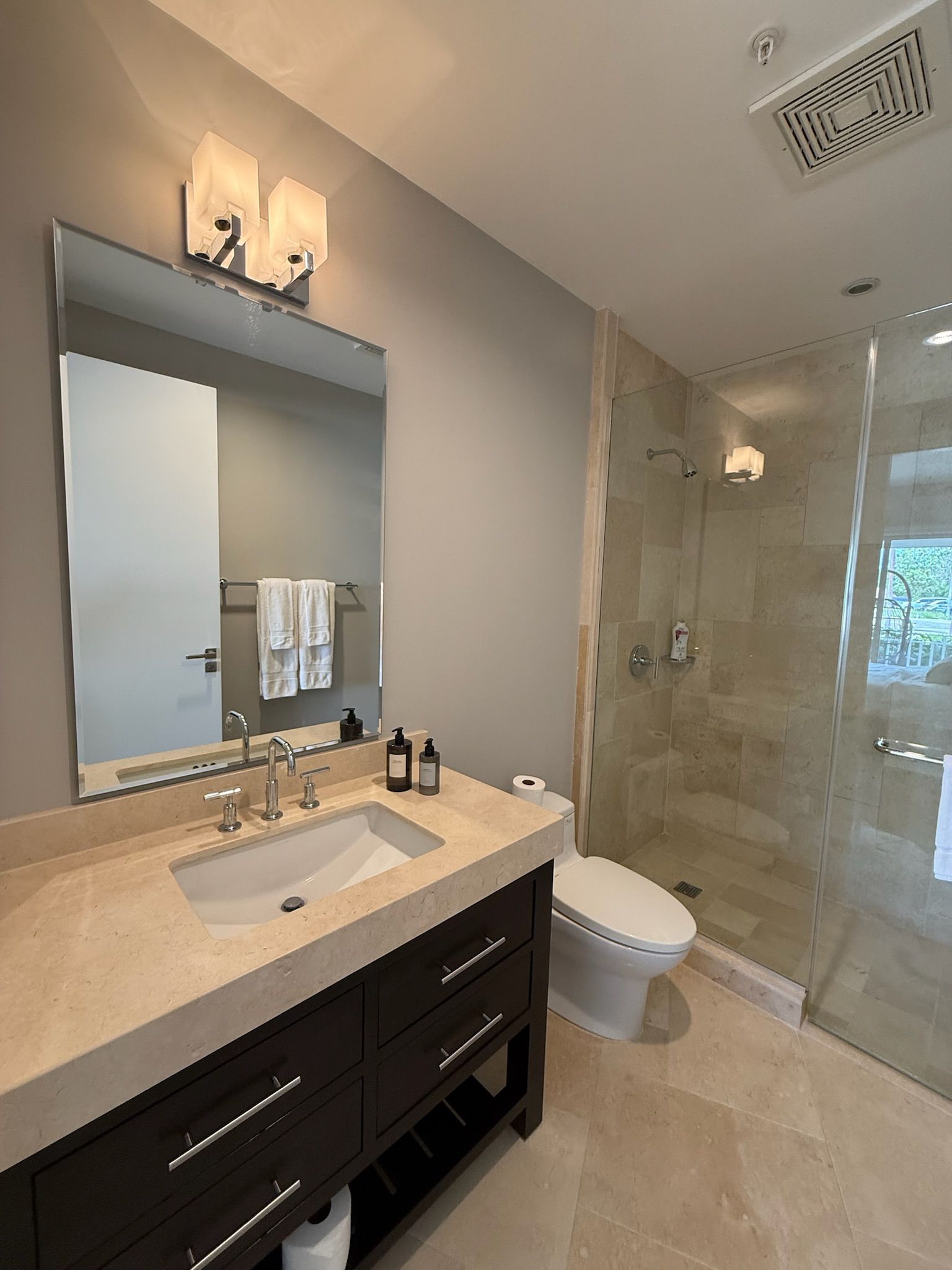 Puntarenas luxury ensuite bathroom. Clean design with glass shower and premium fixtures 4