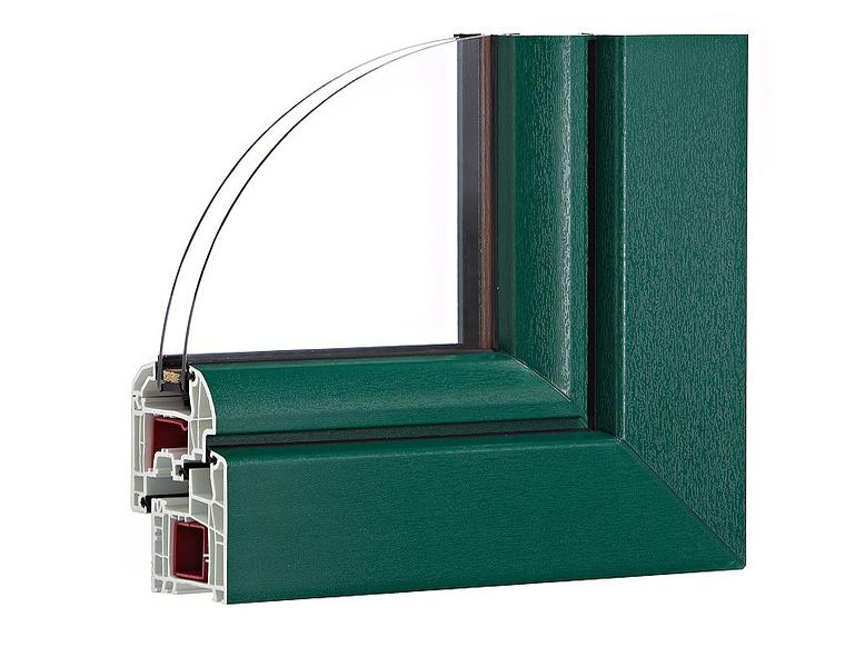 Coupe transversale d'un cadre de fenêtre vert à plusieurs chambres et vitrage incurvé.