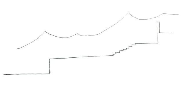 Un dibujo a lápiz de una cadena montañosa sobre un fondo blanco.