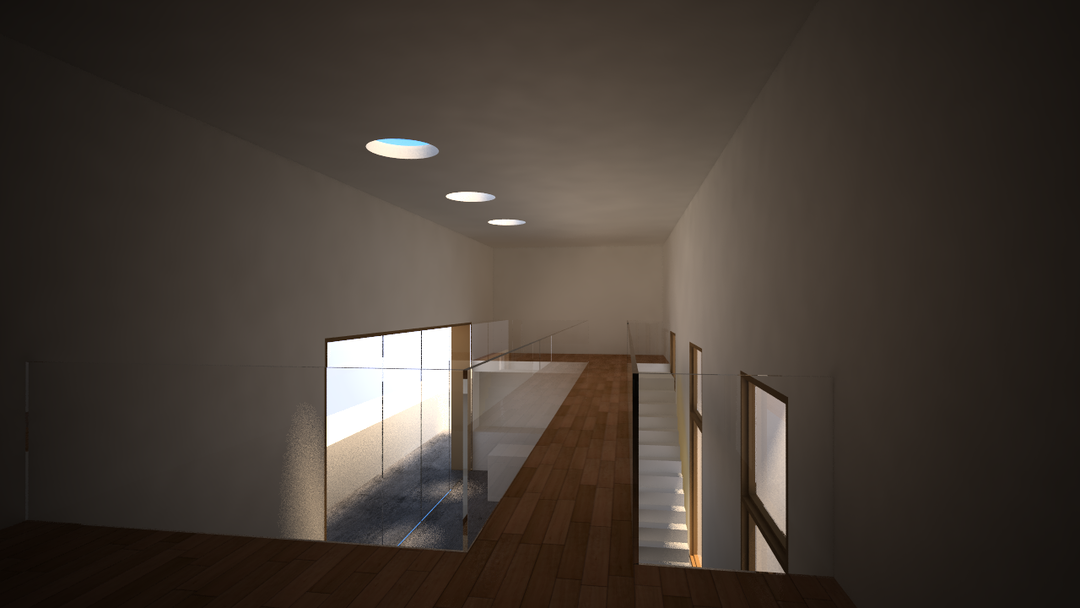 Un pasillo vacío con suelo de madera y escaleras.
