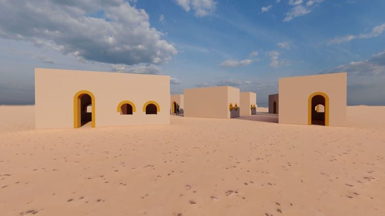 Un grupo de edificios en medio de un desierto.