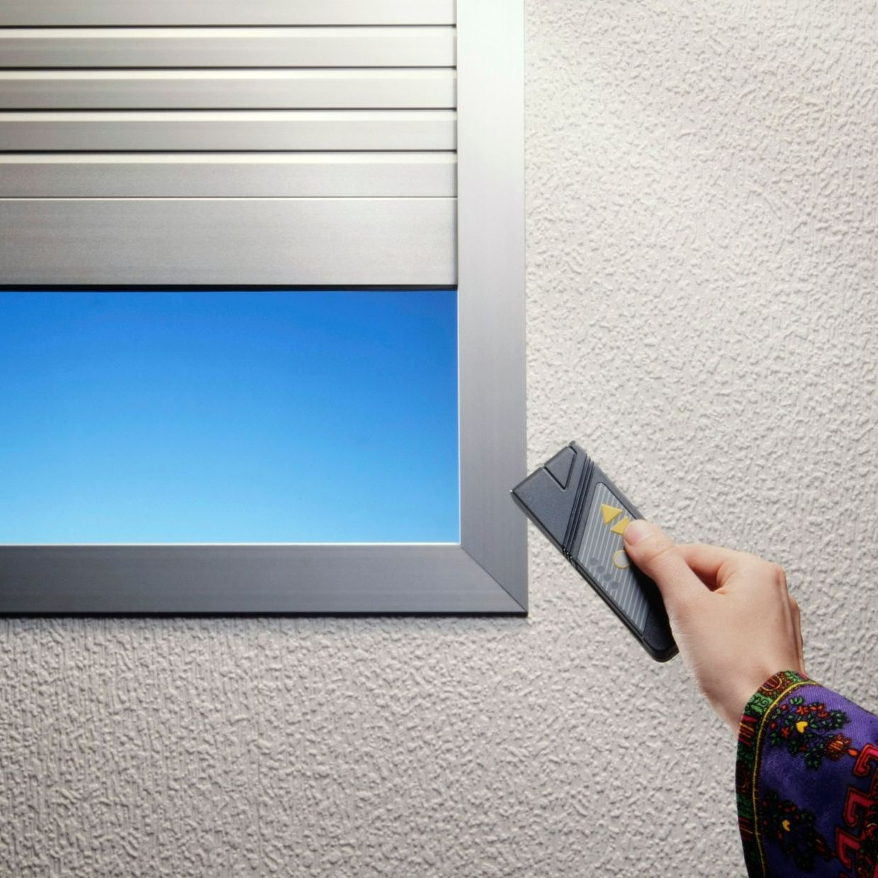 Télécommande pour ouvrir les volets roulants